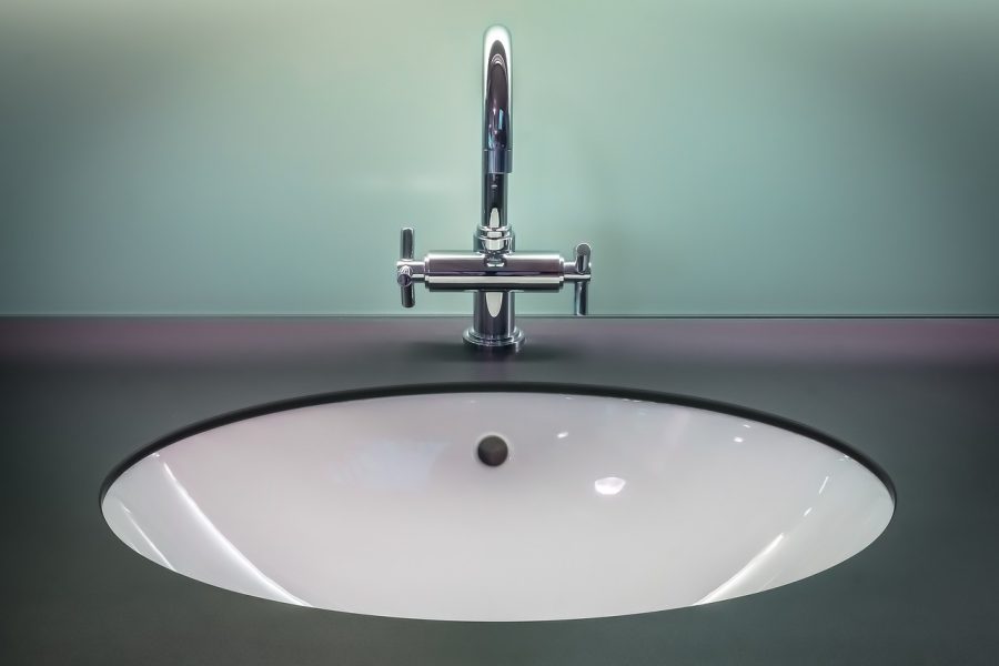 image of faucet and sink https://www.pexels.com/photo/black-and-white-vanity-top-with-stainless-steel-faucet-145512/