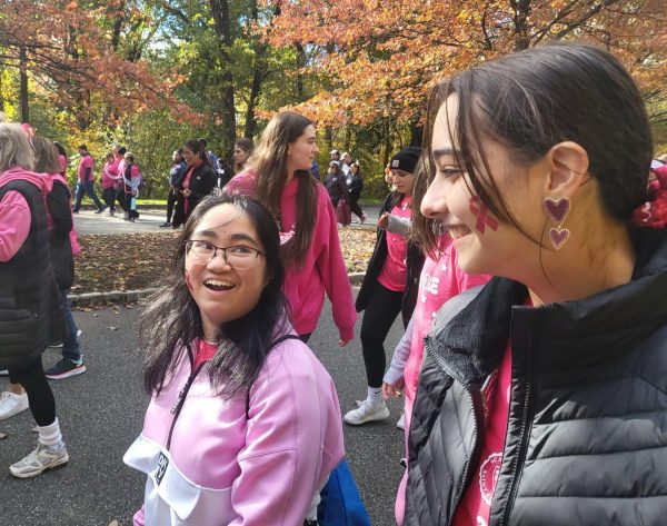 National Honor Society members Melanie Montañez 24 and Maria Clara Bragagnolo Rose 24 at the 2023 Breast Cancer Awareness Walk.