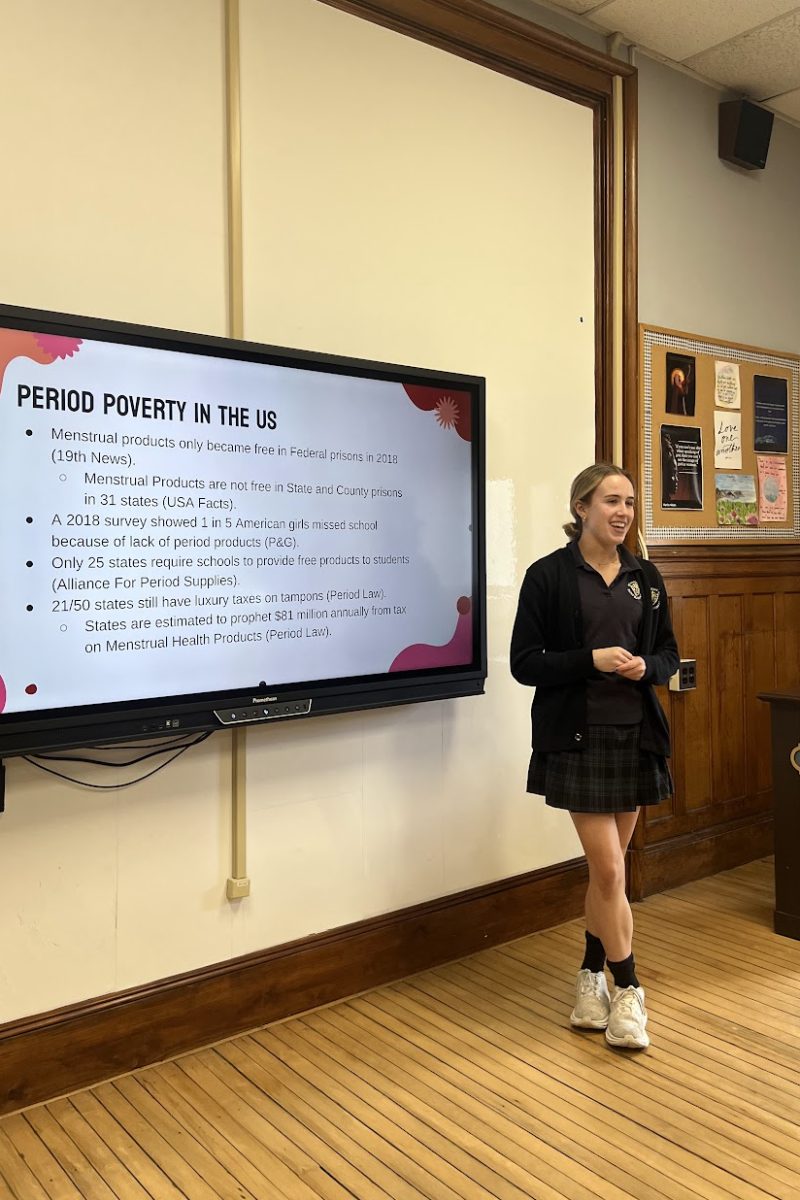 Ella Delatush speaks to her Social Justice class about period poverty.
